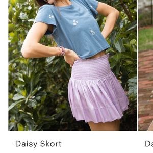 PURPLE AND MAGENTA DAISY SKORT